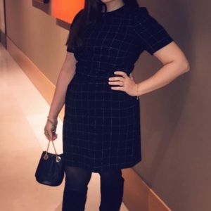 Checkered black and white labeled mini dress